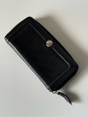 Classic Coach black leather zip-around wallet